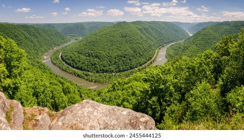 An Overlook of the Winding New River at New River Gorge National Park and Preserve in southern West Virginia in the Appalachian Mountains, USA - Powered by Shutterstock