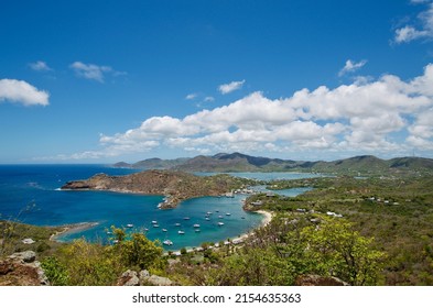 Overlooking English Harbour and Falmouth Harbour from the nearby Shirley Heights viewpoint in Antigua with yachts moored after racing. 