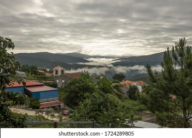 Overlooking Esporao village and countryside in rural Portugal wih low stratus clouds in the valleys - Shutterstock ID 1724289805