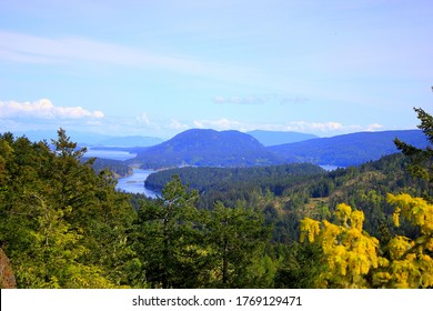 Overlooking The Many Gulf Islands Of British Columbia Canada On A Colourful Day In The Early Fall With Distant Mountains Of The West Coast.