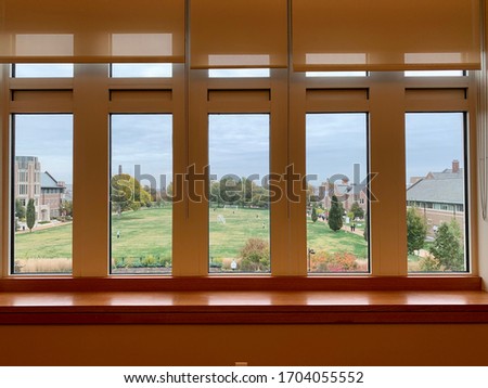Overlooking Mudd Field in five panels on a cloudy day at WashU in St. Louis.