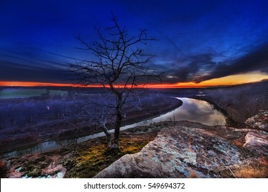 Overlooking The Osage River As The Last Light Of The Sunset Shines Through.