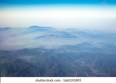 Overlooking The Wuling Mountains From A Plane, Aerial View.