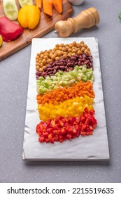 Overnight Soaked Chickpea, Kidney Beans And Chopped Red, Yellow Bell Pepper, Carrot And Cucumber Are Stacked In A Platter Ready To Mix In A Bowl For Protein Salad