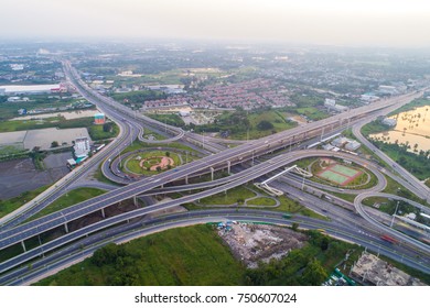 Overpas traffic intersection road topview with green tree in the morning, Transport concept
