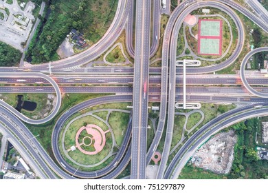 Overpas traffic intersection road topview with green tree in the morning, Transport concept