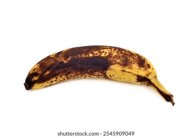 Overripe banana with brown spots isolated on the white background. Close-up. Copy space.  - Powered by Shutterstock