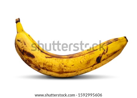 Overripe banana. Yellow banana isolated on a white background. The concept of conservation and quality of food.