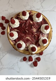 Overshoot photo of delicious raspberry and white chocolate cheesecake 