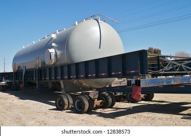 Oversize Trailer With Large Storage Tank.