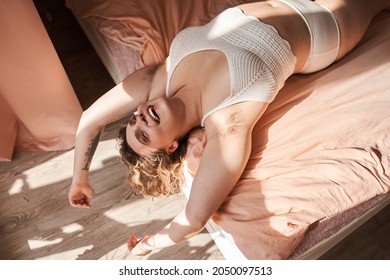 Oversize woman laying and resting on bed