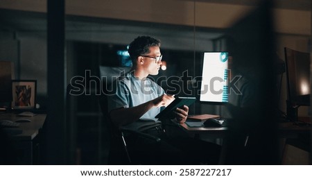 Overtime, creative or man on computer for startup analytics report, deadline or online research. Engagement, night or content strategist on tablet for digital marketing trends or social media growth