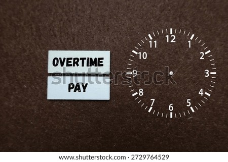 Overtime pay on clock face concept