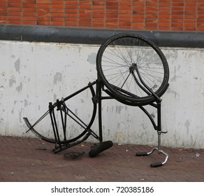 Overturned Bike Ride And With A Wheel Stolen By Thieves In The City