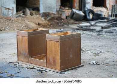 an overturned desk in an abandoned place