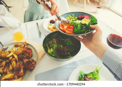 Overvew photo of healthy family dinner with baked potato and chiken and salad with avocado, soybeans and beetroot - Shutterstock ID 1709440294