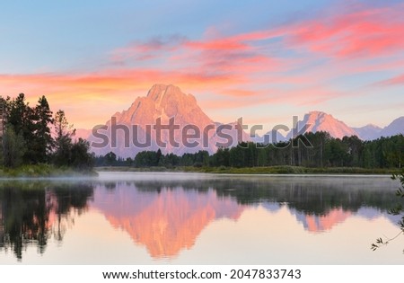 Overview of beautiful sunrise over Grand Teton National Park viewing from the Oxbow Bend Turnout, Wyoming USA