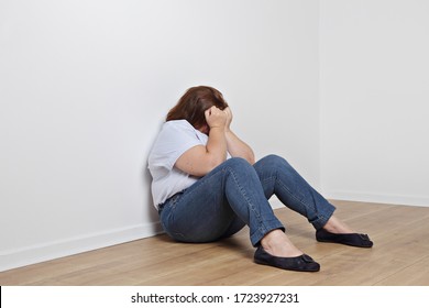 overweight-brunette-woman-depressed-crying-260nw-1723927231.jpg
