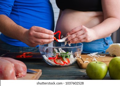 Overweight Couple Cooking Vegetable Salad. Dieting, Weight Losing, Slimming And Healthy Eating