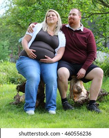 Overweight Couple. Healthy Lifestyle Concept. Obese Adults On Garden Bench. Happy Family Together.