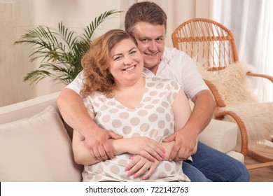 Overweight Couple At Home