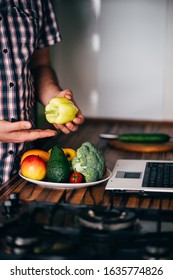 Overweight Man Recording Video Cooking Healthy Food At Home Kitchen. Cooking Recipe Online Culinary Blog, Weight Loss Support