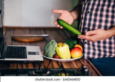 Overweight Man Recording Video Cooking Healthy Food At Home Kitchen. Cooking Recipe Online Culinary Blog, Weight Loss Support