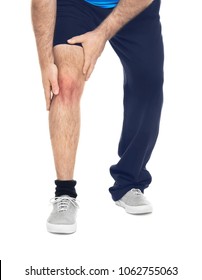 Overweight Man Suffering From Knee Pain On White Background