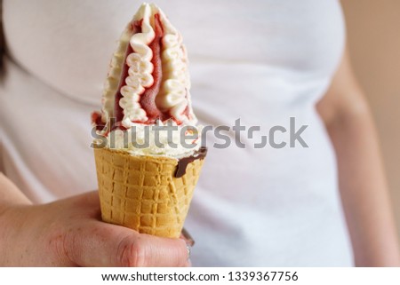 overweight woman eating ice-cream. unhealthy fattening food,high-calorie snack. fattie with sundae in waffle cone