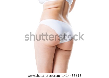 Overweight woman with fat legs and buttocks, obesity female body isolated on white studio background