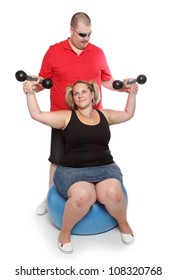 Overweight Woman With Her Personal Fitness Trainer Exercising With Dumbbells.