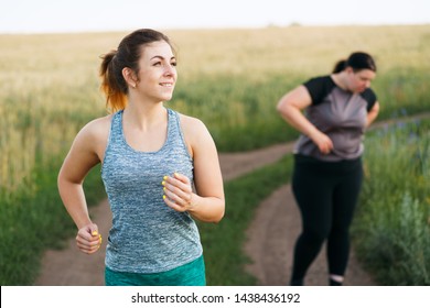 Overweight woman stopped to take breath at outdoor jogging workout. Fitness, sports and health care - Shutterstock ID 1438436192