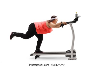 Overweight Woman Trying Not To Fall Off A Treadmill Isolated On White Background