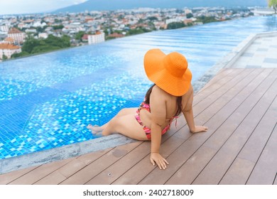 Overweight young woman orange swimsuit and straw beach sun hat relaxing in pool Happy plus size woman body positive Vacation Traveling in summer - Powered by Shutterstock