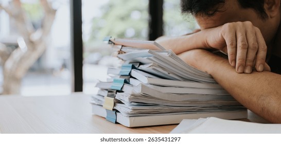 Overwhelmed Man with Stack of Documents
