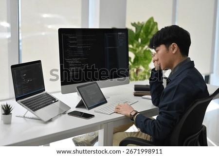 Overwhelmed Programmer Managing Complex Code, Stressed Software Developer at Desk.