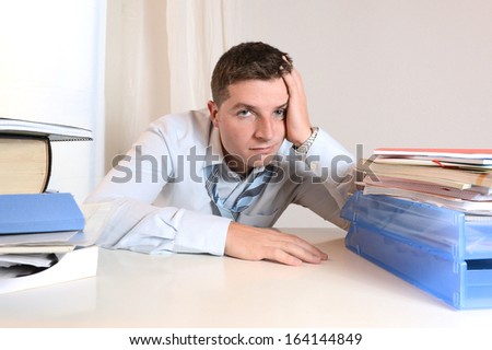  Overwhelmed Stressed Student  or Businessman at Work