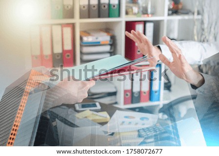 Overworked businessman refusing work; multiple exposure
