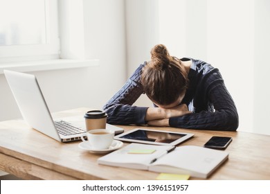 Overworked tired businesswoman . Young exhausted student girl sleeping in office. Woman using laptop, digital tablet, smartphone at home. Entrepreneur, business, freelance work, study, stress concept