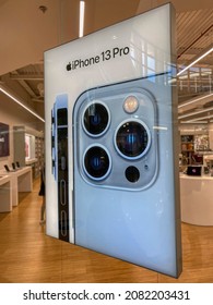 Oviedo, Spain - October 11, 2021: Advertising poster on an App Store announcing the iPhone 13 Pro.