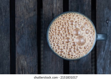 Ovverhead View Of Teh Tarik. It Is Infused Black Tea With Milk Served In Thick Froth. Popular Drinks In Malaysia