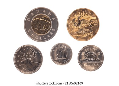 Owen Sound, Ontario - April 27, 2022: Set Of Common Canadian Coinage On White Background, Including Toonie, Loonie, Quarter, Dime, And Nickel.