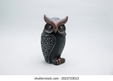 Owl bibelot on white background - Shutterstock ID 2023723013