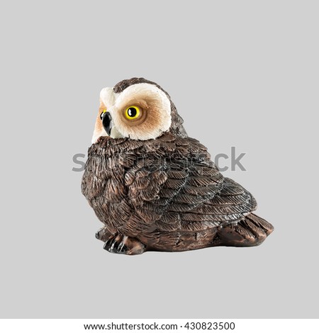owl sculpture isolated on grey