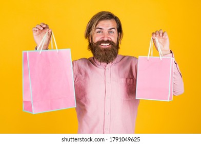 Own business. surprised man unpacking. the package delivery. human emotion and facial expression. bearded man gift holiday decoration. businessman holding gift pack. gift to colleague at work.