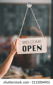 The Owner Of A Small Shop Turned The Sign To Open, Ready To Serve.