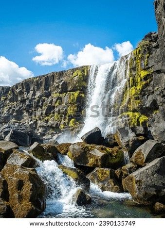 Oxararfoss Waterfall at Thingvellir, Iceland, one of the major attractions on the Golden Circle tourist route - Southwest Iceland.