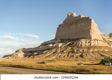 Oxen Pull A Conestoga Covered Wagon On The Oregon Trail, At Mitchell Pass, Scotts Bluff National Monument, Near Eagle Rock And Scottsbluff, Nebraska.