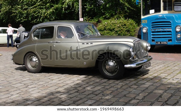 Oxenhope,\
Yorkshire, England - July 4th 2010: 1950\'s Sunbeam Talbot 90 MkII 4\
door saloon car leaving Oxenhope\
station.