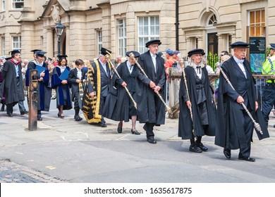 OXFORD, ENGLAND - JUNE 19, 2013: Official proctors and Academics process along Catte street to All Souls College of Oxford University at graduation day